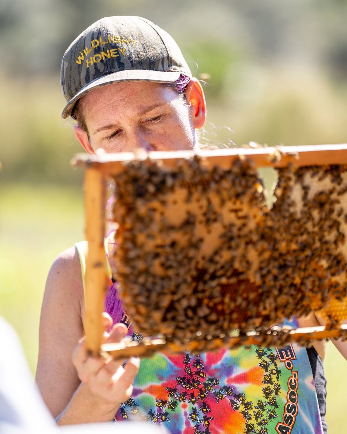 @tucka.bee working her magic with the bees and teaching the next generation of b…
